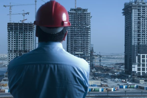 Engineer looks at the building constructions in Dubai